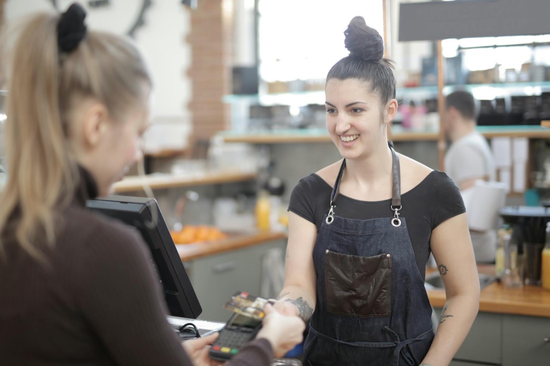 An employee paying for a meal at a Metinvest canteen point of sale